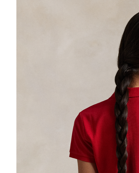 From its meticulous construction – our signature embroidered Pony requires a total of 982 individual stitches to produce – to its breathable cotton mesh fabric,  Ralph Lauren Lauren's Polo shirt has been an icon of American style since 1972. This version is made with a hint of stretch for comfort.