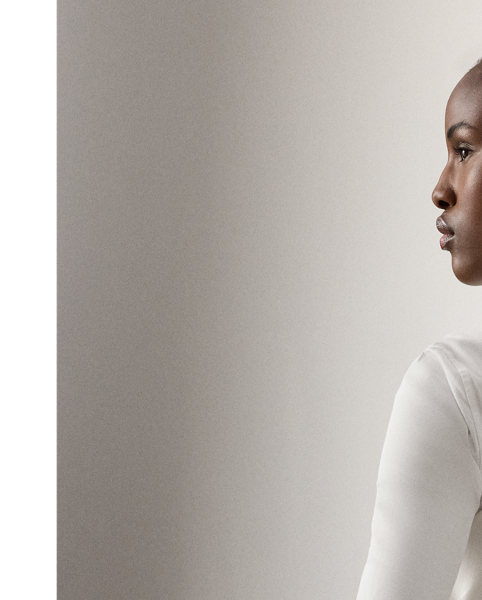 Continuing  Ralph Lauren Lauren's tradition of reinterpreting traditional menswear codes into feminine style, the Zeke waistcoat recasts a men's Purple Label silhouette with a slightly longer length and a shawl collar. Tailored with front waist darts and welt pockets, this cotton piqué waistcoat is designed with a single-breasted four-button placket embellished with genuine mother-of-pearl buttons.