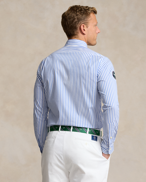 Part of our collection celebrating Wimbledon 2025, this Classic Fit unisex shirt is crafted from lightweight stretch twill. It features the tournament's official logo patch and our signature embroidered Big Pony.