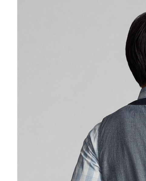 Made with Japanese cotton herringbone that is yarn-dyed with indigo. Adjustable buckled back. Fully lined. Corozo buttons.