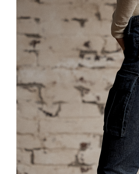 Skinny-fitting cargo pants made with 10 oz. Japanese stretch denim. Cargo pockets on the thighs and knees. Articulated knees for ease of movement. Zip cuffs.