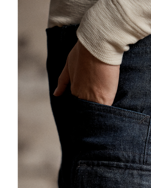 Skinny-fitting cargo pants made with 10 oz. Japanese stretch denim. Cargo pockets on the thighs and knees. Articulated knees for ease of movement. Zip cuffs.