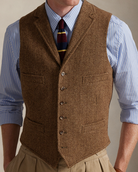 This unisex waistcoat combines expert Italian crafting with a herringbone fabric that was woven at Magee 1866, which has been creating authentic tweeds in the Donegal region of Ireland for more than 150 years.