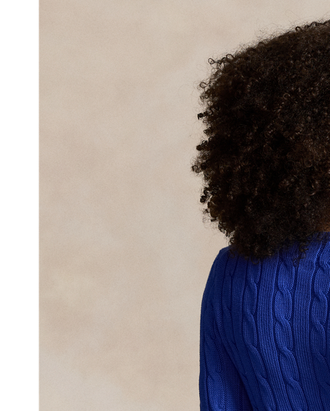 A Polo essential, this slim-fitting crewneck jumper is made with breathable cotton and showcases our signature cable-knit construction.