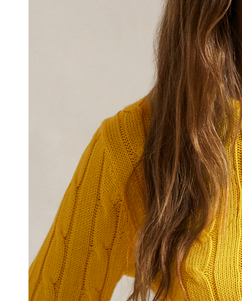 A Polo essential, this slim-fitting crewneck jumper is made with breathable cotton and showcases our signature cable-knit construction.