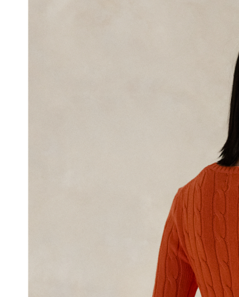 A Polo essential, this slim-fitting crewneck jumper is made with breathable cotton and showcases our signature cable-knit construction.