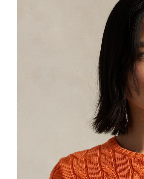 A Polo essential, this slim-fitting crewneck jumper is made with breathable cotton and showcases our signature cable-knit construction.