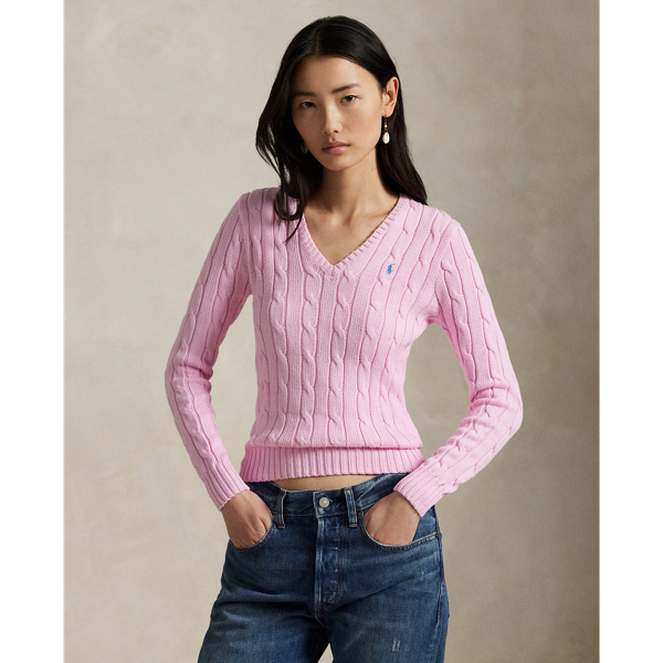 Crafted with combed cotton for a soft hand, this essential V-neck jumper is defined by a cable-knit construct and slim-fitting silhouette. Our embroidered Pony on the chest lends a signature finish.
