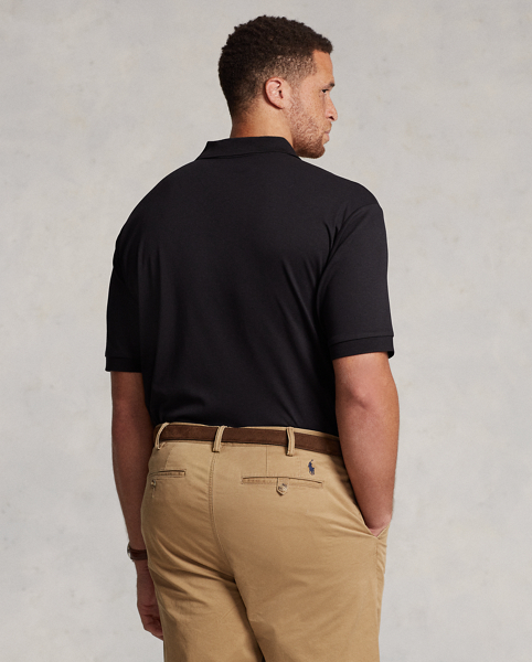 An American style standard since 1972, the Polo shirt has been imitated but never matched. Over the decades, Ralph Lauren Lauren has re-imagined his signature style in a wide array of colours and fits, yet all retain the quality and attention to detail of the iconic original. This Big & Tall version is made from luxe cotton interlock featuring an ultra-soft finish.