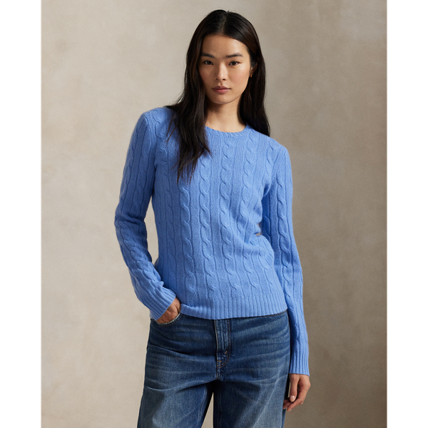 Inspired by fishermen's ropes, the cable-knit jumper's defining motif has transformed from a practical, hard-wearing construction into a symbol of collegiate style. This version is crafted from luxuriously soft cashmere, which is spun and dyed in a renowned Italian mill.