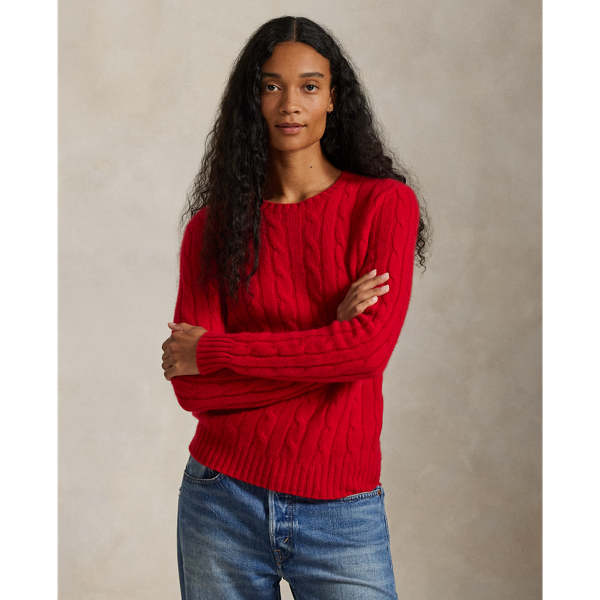 Inspired by fishermen's ropes, the cable-knit jumper's defining motif has transformed from a practical, hard-wearing construction into a symbol of collegiate style. This version is crafted from luxuriously soft cashmere, which is spun and dyed in a renowned Italian mill.