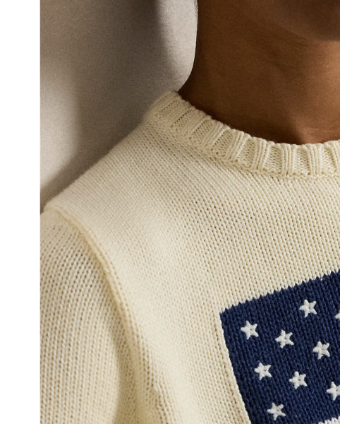 Made in the USA, The Iconic American Flag Jumper from Polo  Ralph Lauren Lauren embodies Mr Lauren's long-standing love of American style. This version is crafted with roving cotton for a textured surface and features an intarsia-knit flag motif with 13 embroidered stars.