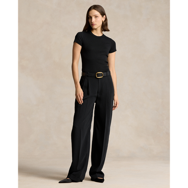 Crafted with fluid matte satin, these straight-leg trousers feature menswear-inspired details, including a pleated front waist and crisp creases along each leg.