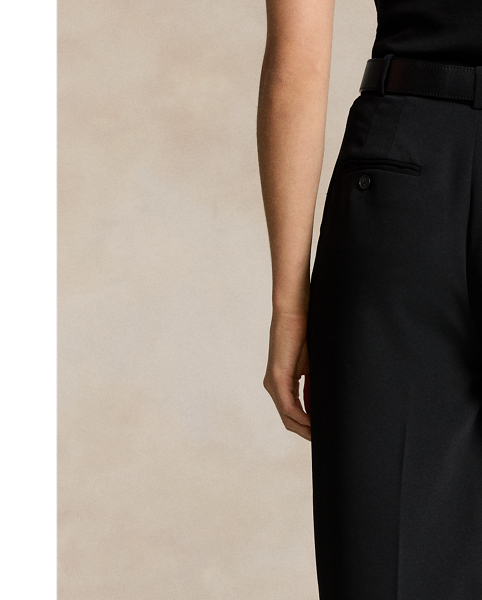 Crafted with fluid matte satin, these straight-leg trousers feature menswear-inspired details, including a pleated front waist and crisp creases along each leg.