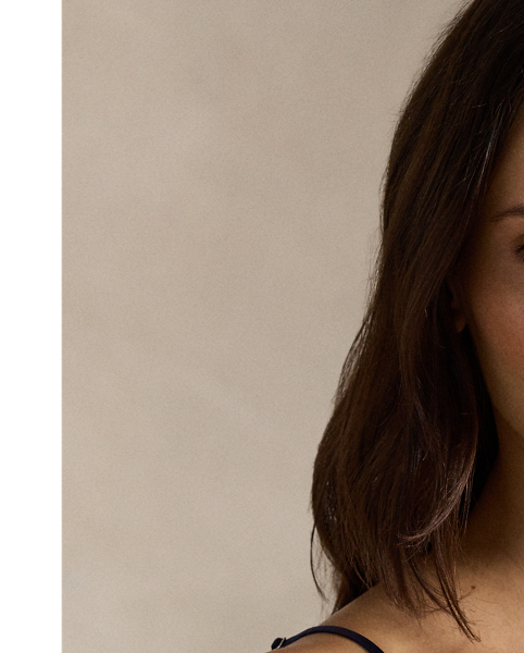 Crafted with smooth silk, this camisole achieves a flawless fit with adjustable spaghetti straps.