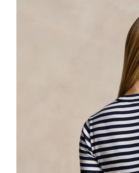 This rib-knit crewneck tee is knit with yarn-dyed stripes and a touch of stretch for a figure-skimming fit.