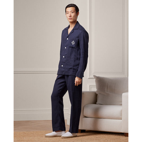 This pyjama set is tailored in Italy using premium linen. Detailed with genuine mother-of-pearl buttons, it is embroidered with Purple Label's signature Art Deco-inspired monogram on the shirt and the coordinating travel pouch.
