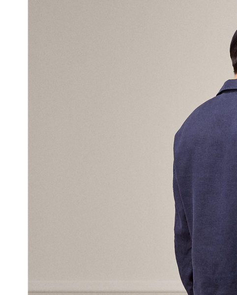 This pyjama set is tailored in Italy using premium linen. Detailed with genuine mother-of-pearl buttons, it is embroidered with Purple Label's signature Art Deco-inspired monogram on the shirt and the coordinating travel pouch.