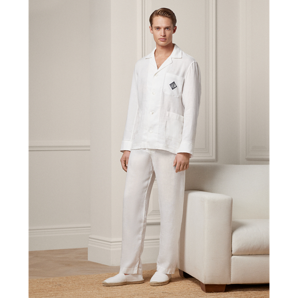 This pyjama set is tailored in Italy using premium linen. Detailed with genuine mother-of-pearl buttons, it is embroidered with Purple Label's signature Art Deco-inspired monogram on the shirt and the coordinating travel pouch.