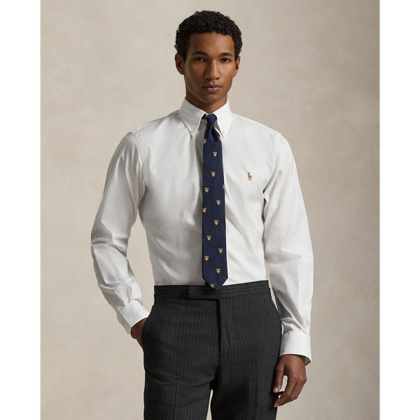 Mercerised cotton and a trim shape put a fresh spin on our iconic pinpoint oxford shirt, while its wrinkle-resistant finish ensures easy care.