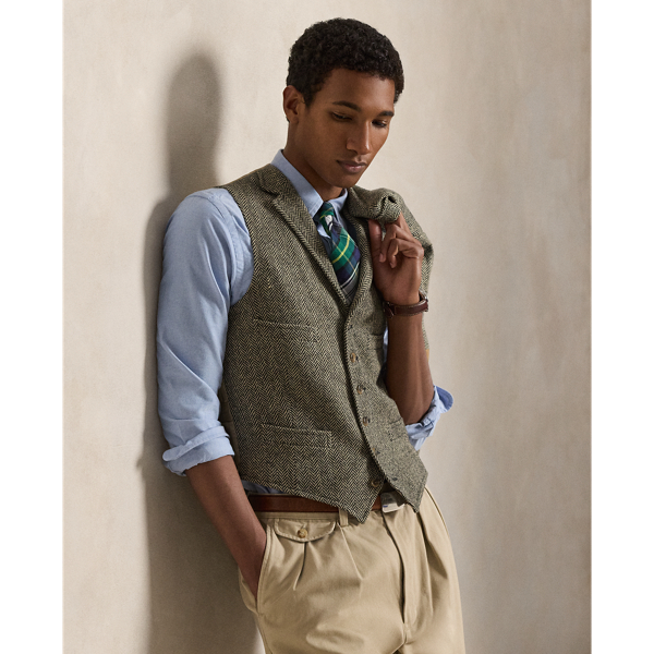 This unisex waistcoat is crafted in Italy with a wool tweed cloth that was custom-developed for Polo  Ralph Lauren Lauren by Magee 1866 in Ireland.