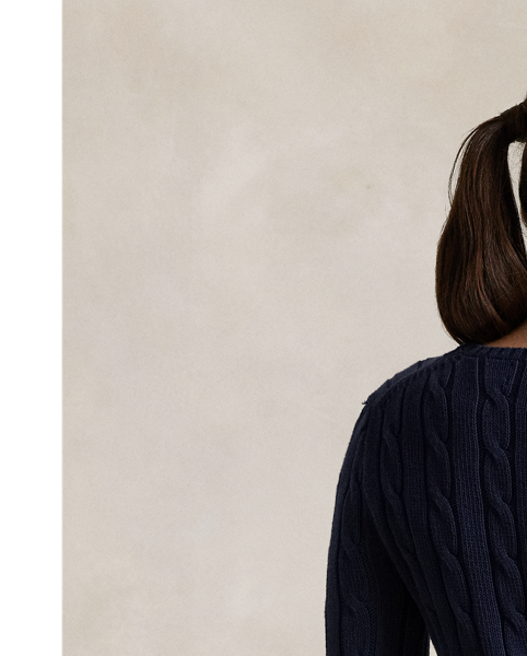 A Polo essential, this slim-fitting crewneck jumper is made with breathable cotton and showcases our signature cable-knit construction.