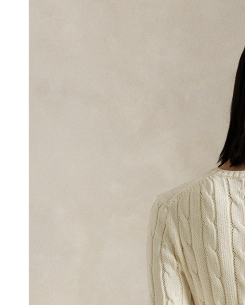 A Polo essential, this slim-fitting crewneck jumper is made with breathable cotton and showcases our signature cable-knit construction.