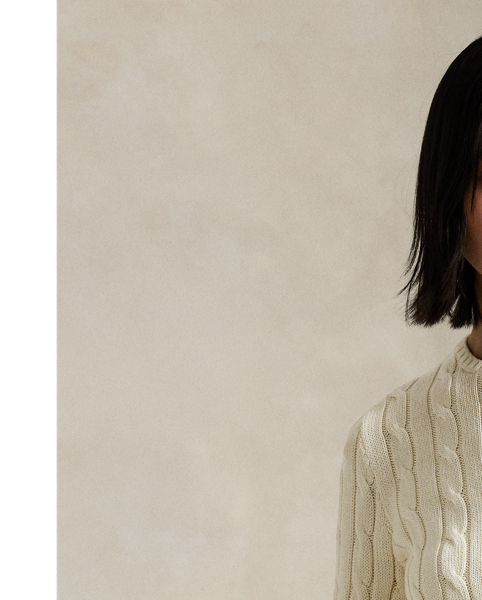 A Polo essential, this slim-fitting crewneck jumper is made with breathable cotton and showcases our signature cable-knit construction.