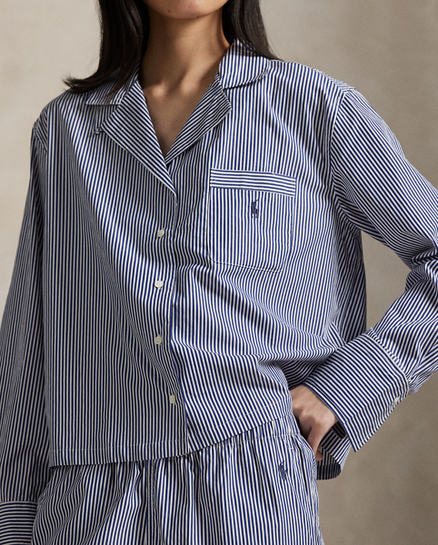 This two-piece pyjama set is designed with classic shirting stripes and embroidered with our signature Pony. Crafted for comfort and longevity, it's made with cotton poplin specially selected for its breathability and soft hand feel that will only get better over time. Ralph Lauren Lauren partners with Better Cotton™ to improve cotton farming globally. Better Cotton trains farmers to use water efficiently, care for the health of soil and natural habitats, reduce use of the most harmful chemicals and implement the principles of decent work.