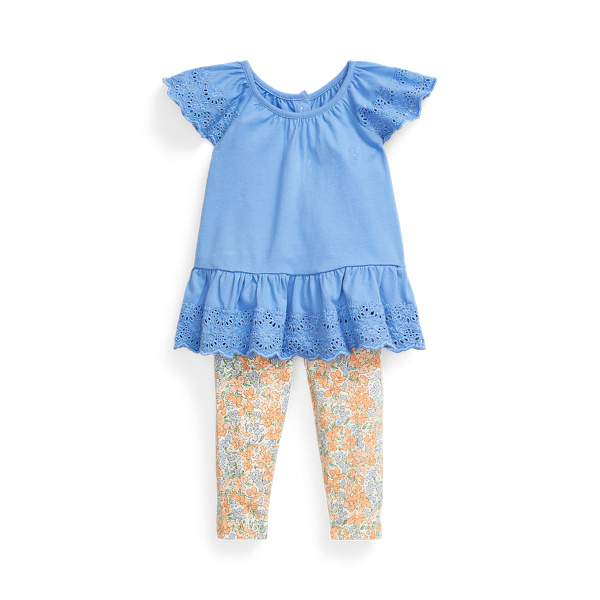 Leggings florais e top de ilhós de malha