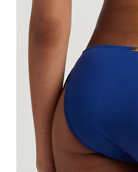 Designed with self-ties on each side, this hipster bikini bottom pairs beautifully with any of Lauren's bikini or tankini tops. An "LRL"-engraved metal plaque on the centre back affords a signature finish.