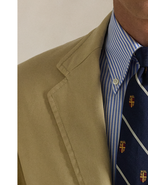 Our Polo Soft blazer puts a modern spin on classic preppy style with a natural shoulder, slightly structured chest and partial lining. This version is crafted from a custom stretch chino cloth and garment-dyed to create a relaxed look.