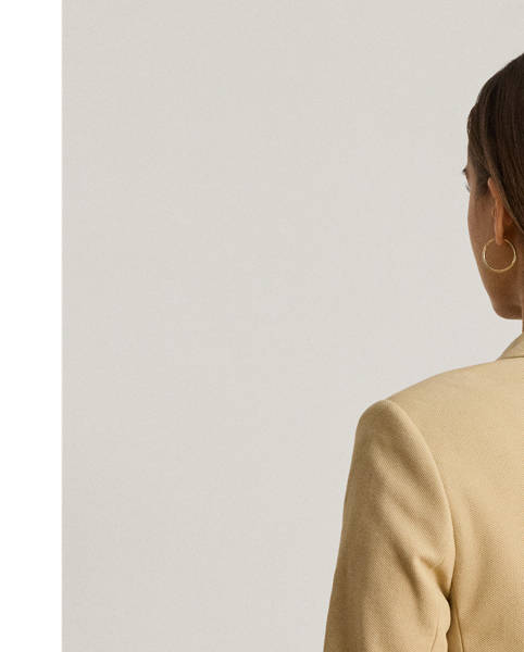 This chic jacquard blazer embodies Lauren style with a signature bullion patch on the chest and luxurious crest-embossed buttons.