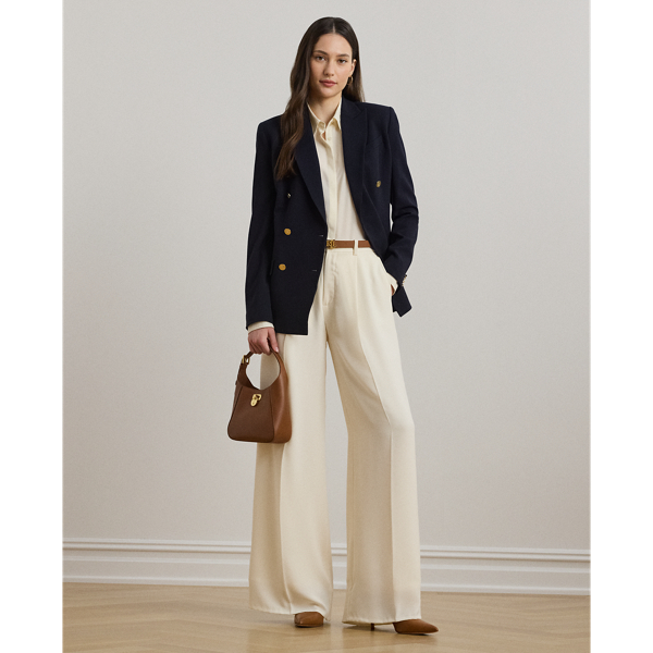 Crafted with luxurious double-faced georgette for a polished look, these wide-leg trousers are a tailored wardrobe essential. Crisp creases and back waist darts enhance their leg-elongating silhouette.