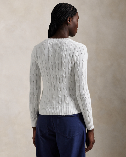 Crafted with combed cotton for a soft hand, this essential V-neck jumper is defined by a cable-knit construct and slim-fitting silhouette. Our embroidered Pony on the chest lends a signature finish.