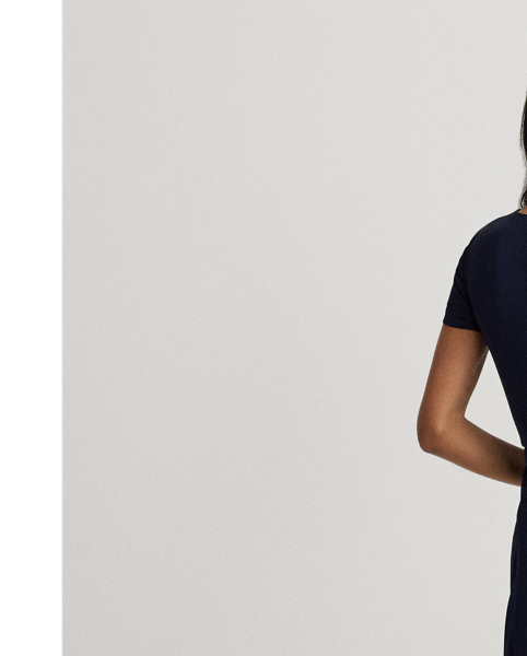 Accented with a signature plaque on the neck, this fit-and-flare dress is rendered in silky georgette for a luxurious hand and sweeping movement. A faux-leather "LRL"-engraved buckled self-belt completes the look.