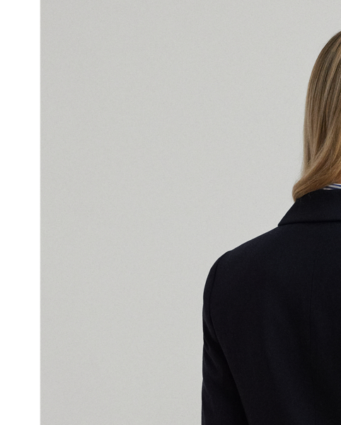 A timeless essential, this blazer is made from stretch-infused wool crepe for a polished look and a comfortable feel. A double-breasted silhouette, princess seams and peak lapels amplify its sophisticated sensibility.