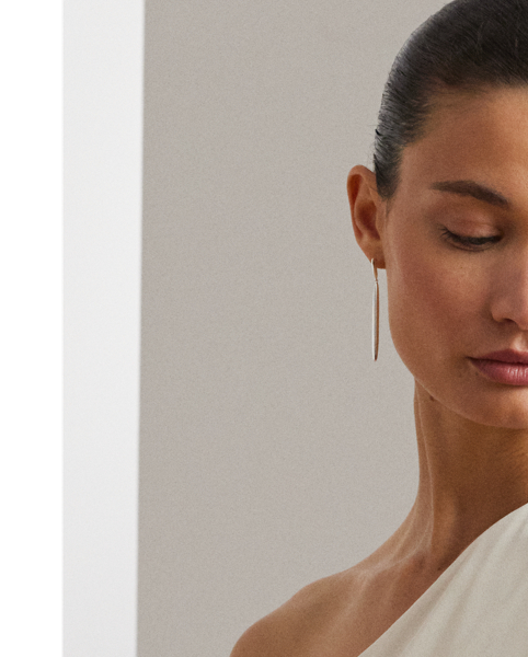 An elegant choice for your next occasion, this statuesque one-shoulder jumpsuit is defined by a cascading cape. Its luxurious georgette fabrication creates fluid movement with each step.