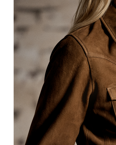 Sueded sheepskin jacket with a waist-length fit. Accented with chest pockets and Western-style yokes. Snapped placket and cuffs.