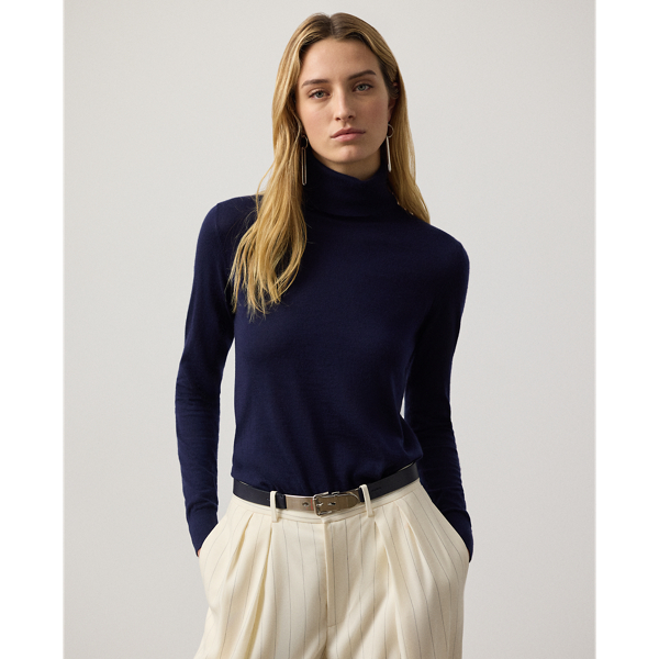 Our featherweight Cradle to Cradle Certified (C2C Certified) Gold Roll Neck Jumper is knit with fine cashmere fibres sourced in Italy, dyed in rich hues and features a re-imagined cotton signature label. C2C certification is the global standard for products that are safe and circular.  Ralph Lauren Lauren partnered with an independent assessment body to ensure that every component of this jumper meets the C2C Certified Product Standards set by the Cradle to Cradle Products Innovation Institute (C2CPII).