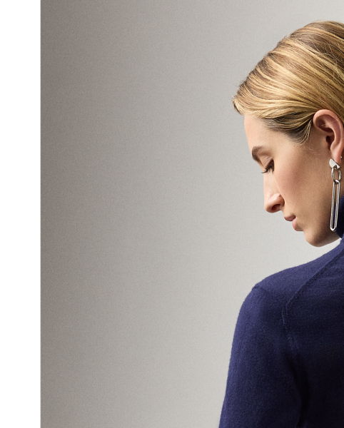 Our featherweight Cradle to Cradle Certified (C2C Certified) Gold Roll Neck Jumper is knit with fine cashmere fibres sourced in Italy, dyed in rich hues and features a re-imagined cotton signature label. C2C certification is the global standard for products that are safe and circular.  Ralph Lauren Lauren partnered with an independent assessment body to ensure that every component of this jumper meets the C2C Certified Product Standards set by the Cradle to Cradle Products Innovation Institute (C2CPII).