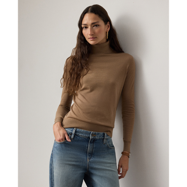 Our featherweight Cradle to Cradle Certified (C2C Certified) Gold Roll Neck Jumper is knit with fine cashmere fibres sourced in Italy, dyed in rich hues and features a re-imagined cotton signature label. C2C certification is the global standard for products that are safe and circular.  Ralph Lauren Lauren partnered with an independent assessment body to ensure that every component of this jumper meets the C2C Certified Product Standards set by the Cradle to Cradle Products Innovation Institute (C2CPII).