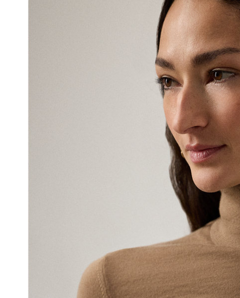 Our featherweight Cradle to Cradle Certified (C2C Certified) Gold Roll Neck Jumper is knit with fine cashmere fibres sourced in Italy, dyed in rich hues and features a re-imagined cotton signature label. C2C certification is the global standard for products that are safe and circular.  Ralph Lauren Lauren partnered with an independent assessment body to ensure that every component of this jumper meets the C2C Certified Product Standards set by the Cradle to Cradle Products Innovation Institute (C2CPII).