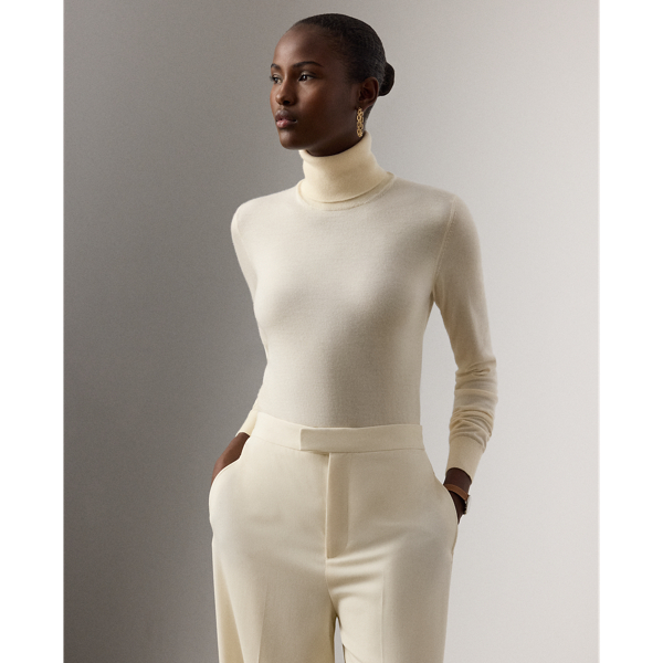 Our featherweight Cradle to Cradle Certified (C2C Certified) Gold Roll Neck Jumper is knit with fine cashmere fibres sourced in Italy, dyed in rich hues and features a re-imagined cotton signature label. C2C certification is the global standard for products that are safe and circular.  Ralph Lauren Lauren partnered with an independent assessment body to ensure that every component of this jumper meets the C2C Certified Product Standards set by the Cradle to Cradle Products Innovation Institute (C2CPII).