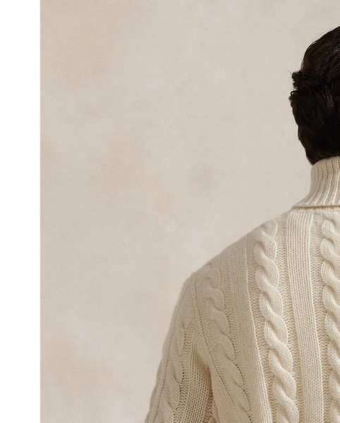 This unisex version of our iconic cable-knit roll neck jumper is knit with an Italian wool yarn that’s spun with a hint of cashmere.