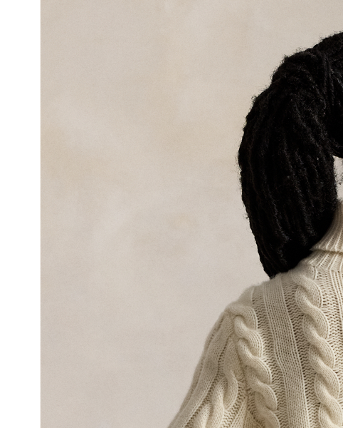 This unisex version of our iconic cable-knit roll neck jumper is knit with an Italian wool yarn that’s spun with a hint of cashmere.