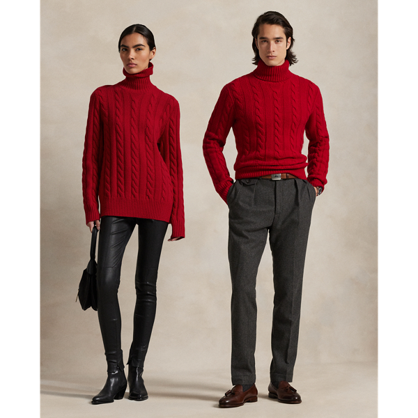 This unisex version of our iconic cable-knit roll neck jumper is knit with an Italian wool yarn that’s spun with a hint of cashmere.