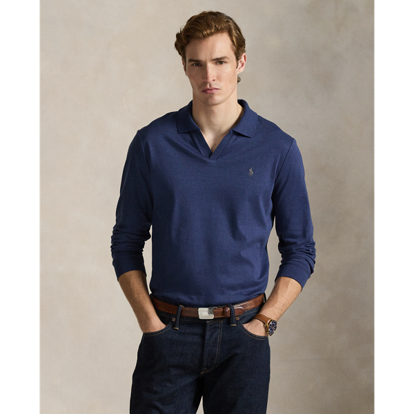 An American style standard since 1972, the Polo shirt has been imitated but never matched. Over the decades,  Ralph Lauren Lauren has reimagined his signature style in a wide array of colours and fits, yet all retain the quality and attention to detail of the iconic original. This long-sleeve version is made with luxe cotton interlock that features an ultrasoft finish.  Ralph Lauren Lauren partners with Better Cotton™ to improve cotton farming globally. Better Cotton trains farmers to use water efficiently, care for the health of soil and natural habitats, reduce use of the most harmful chemicals and implement the principles of decent work.