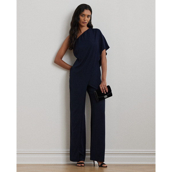 An elegant choice for your next occasion, this statuesque one-shoulder jumpsuit is defined by a cascading cape. Its luxurious georgette fabrication creates fluid movement with each step.
