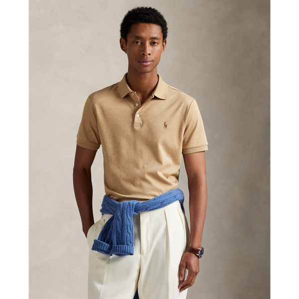 An American style standard since 1972, the Polo shirt has been imitated but never matched. Over the decades, Ralph Lauren Lauren has re-imagined his signature style in a wide array of colours and fits, yet all retain the quality and attention to detail of the iconic original. This trim version is made from luxe cotton interlock, which features an ultra-soft finish.